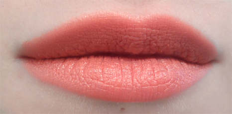 modelco party proof matte lipstick disco fever orange coral lips swatch
